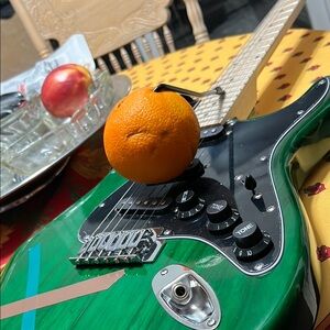 Glarry Green Electric Guitar with Black Accents